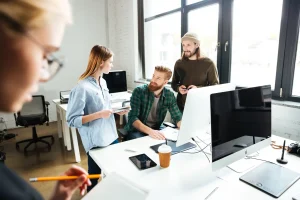 concentrated-colleagues-office-using-computer-scaled